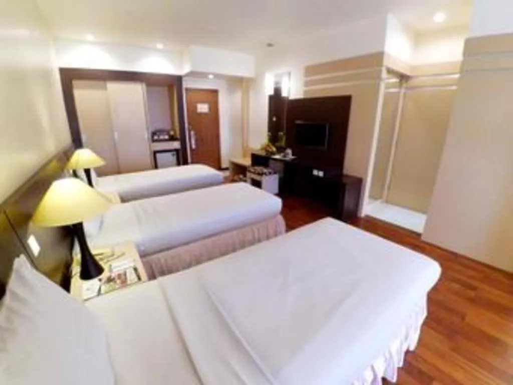 Bed in Purnama Hotel