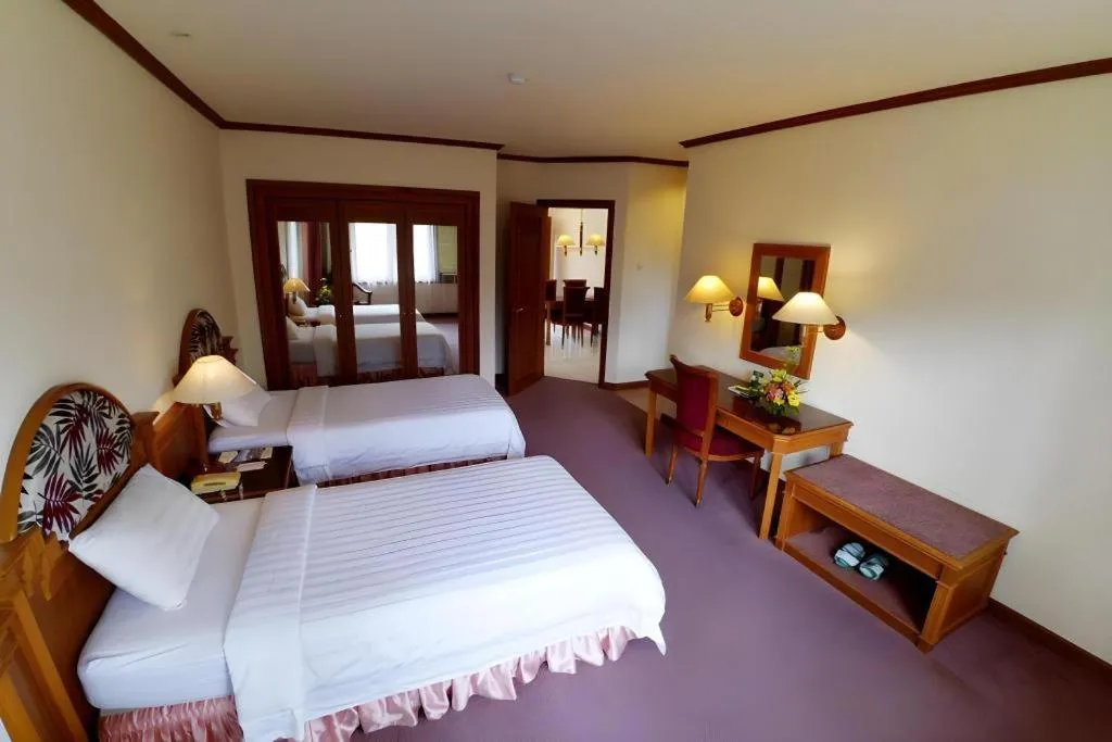 Bed in Purnama Hotel