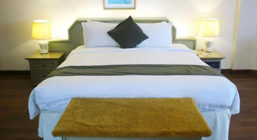 Bed in Purnama Hotel