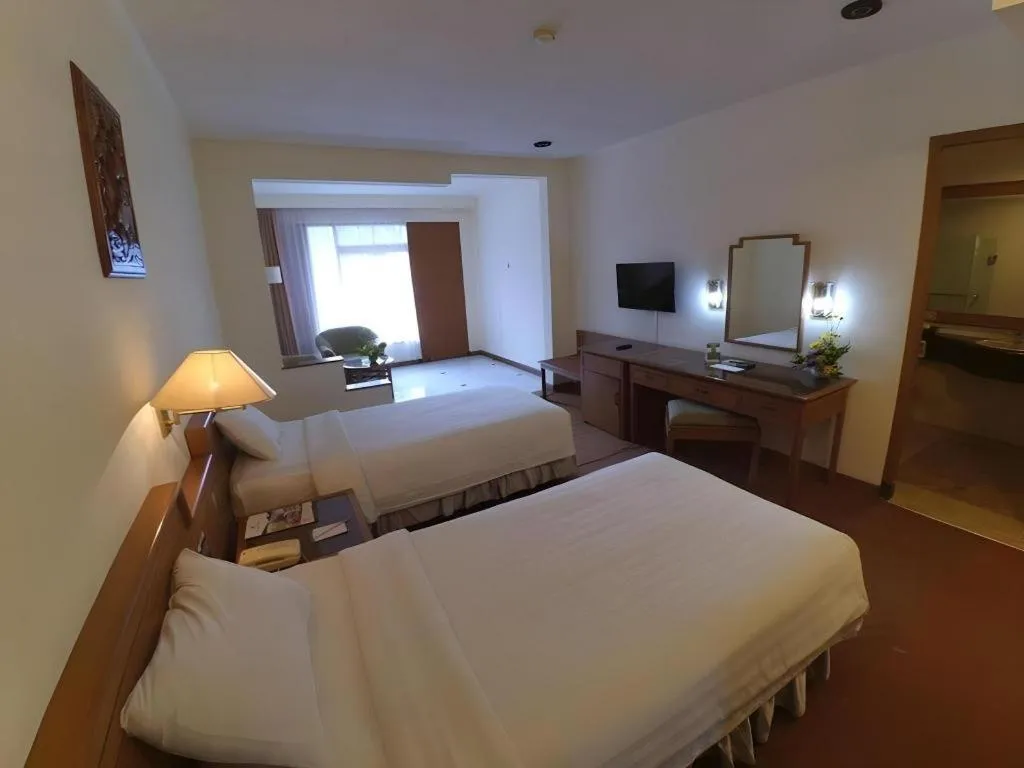 Bed in Purnama Hotel