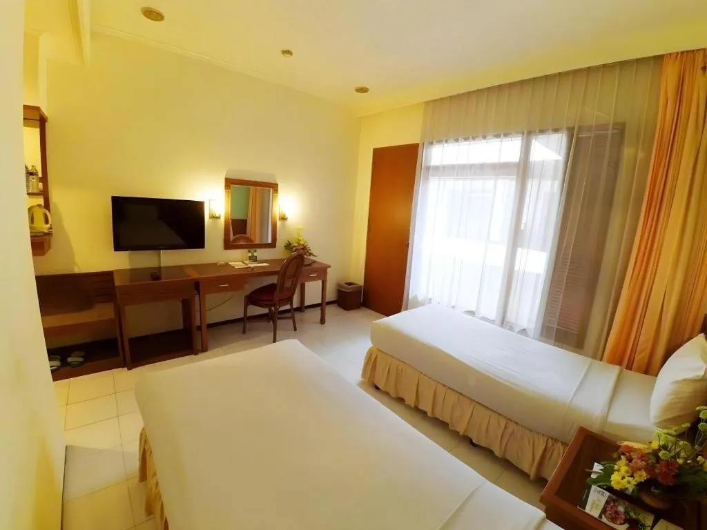 Bed in Purnama Hotel