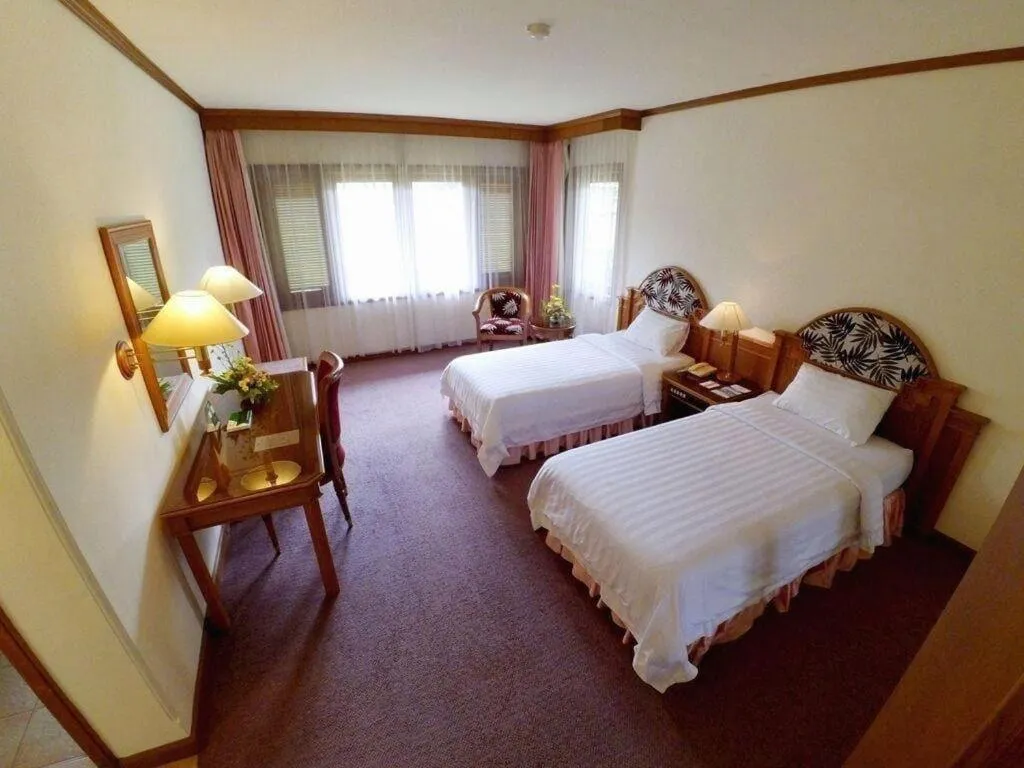 Bed in Purnama Hotel