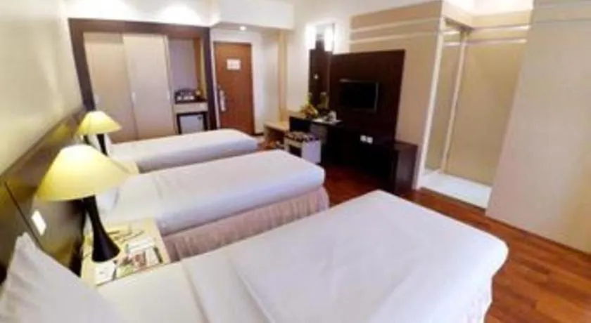 Bed in Purnama Hotel