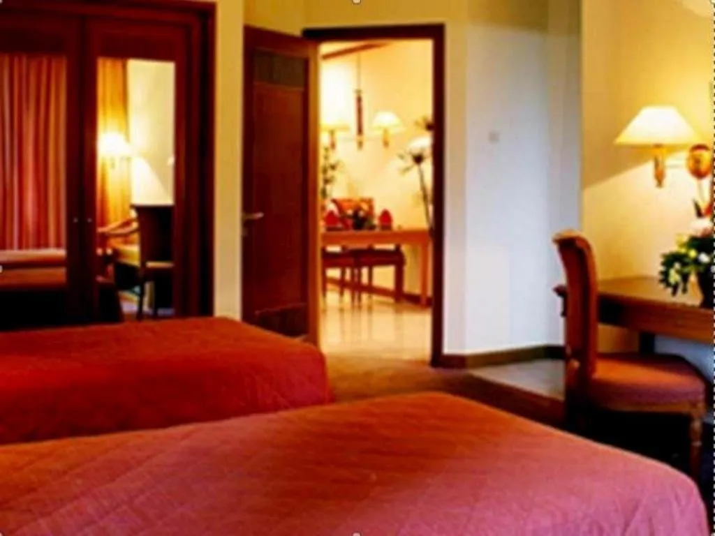 Bed in Purnama Hotel