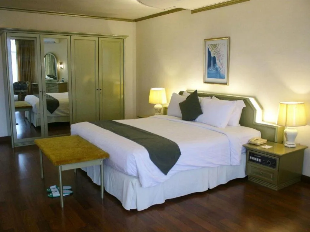 Bed in Purnama Hotel