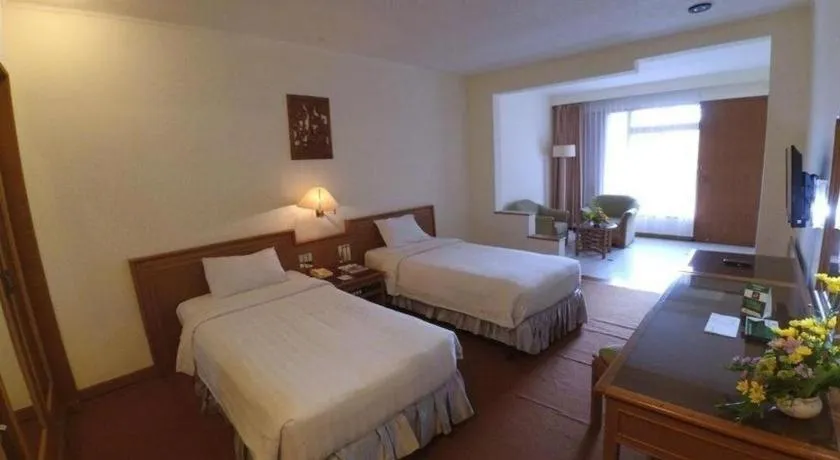 Bed in Purnama Hotel