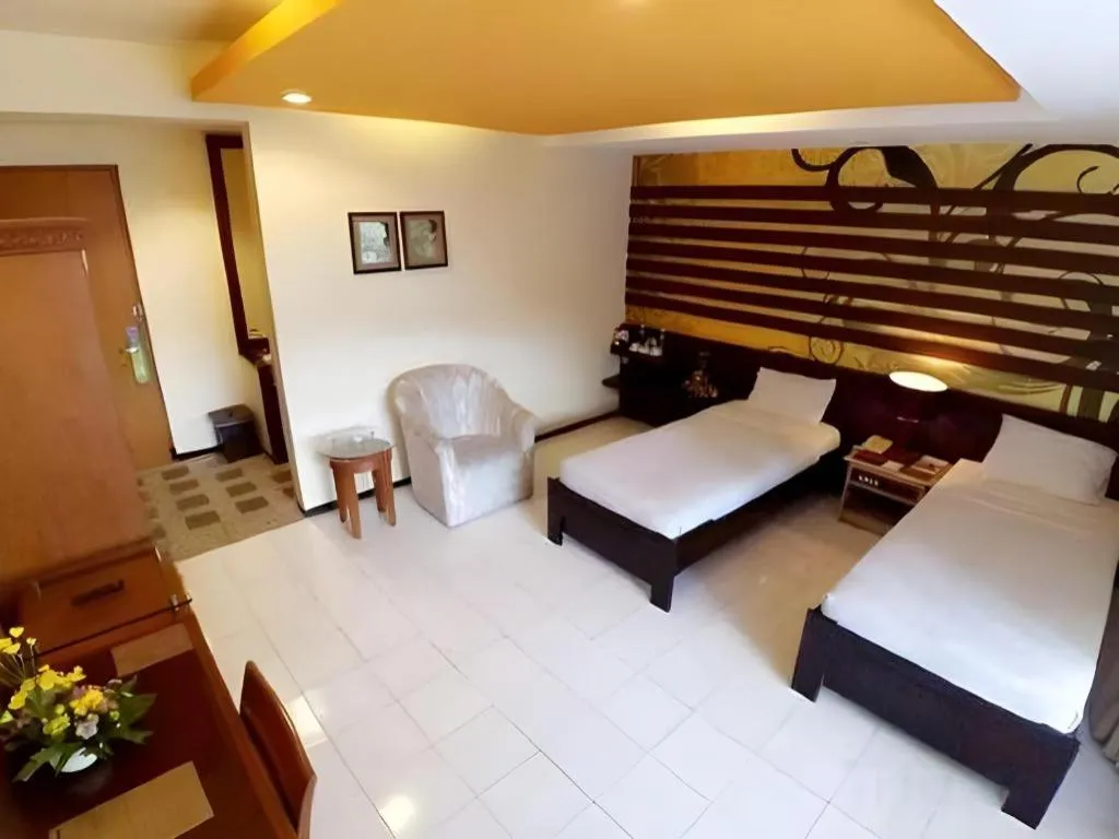 Bed in Purnama Hotel