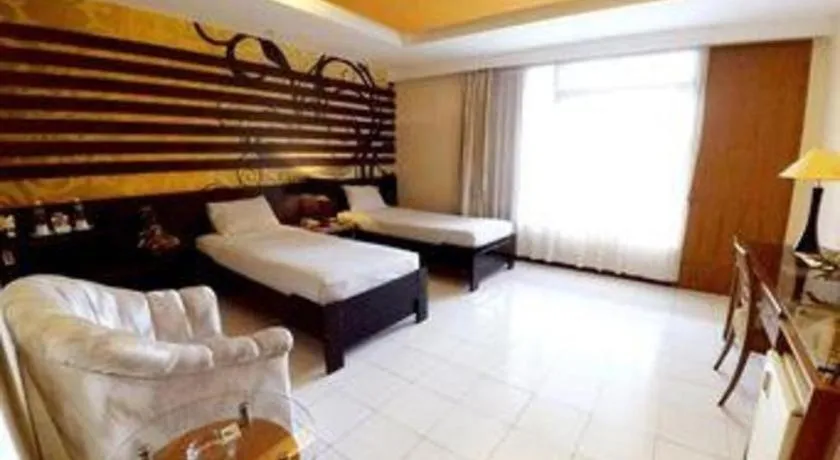 Bed in Purnama Hotel