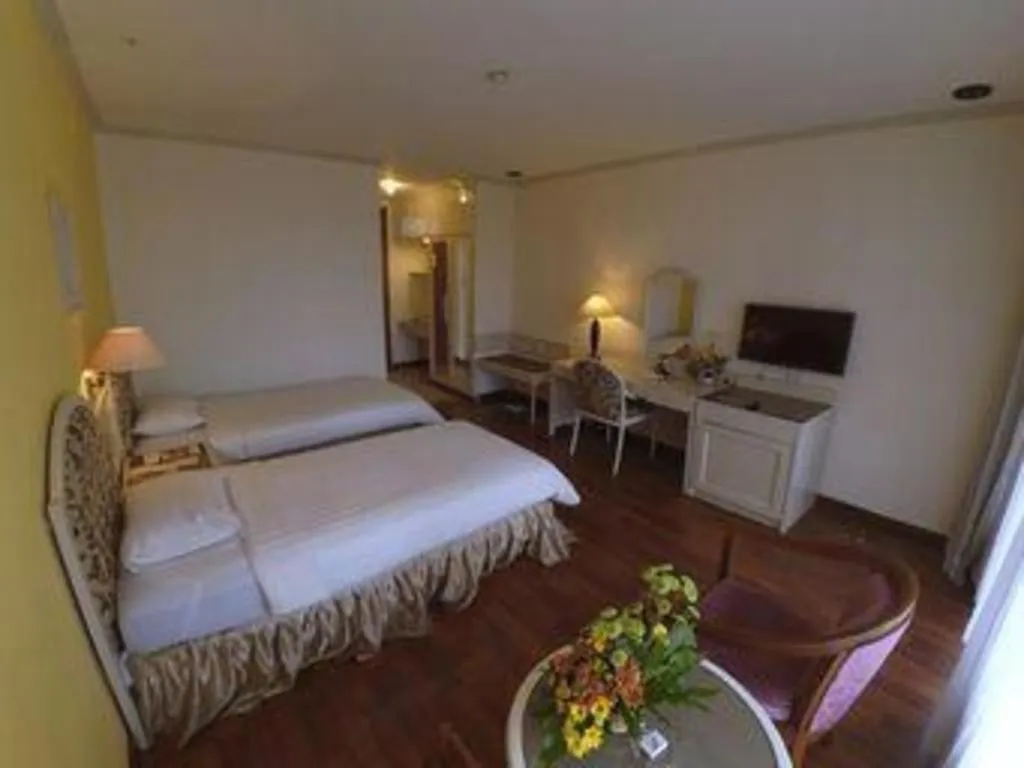 Bed in Purnama Hotel