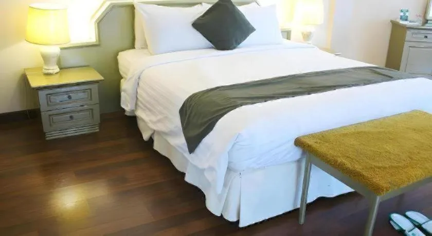 Bed in Purnama Hotel