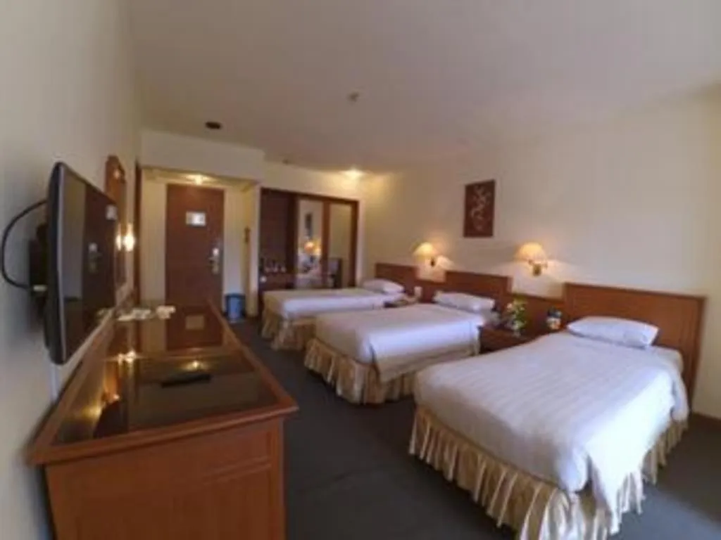 Bed in Purnama Hotel