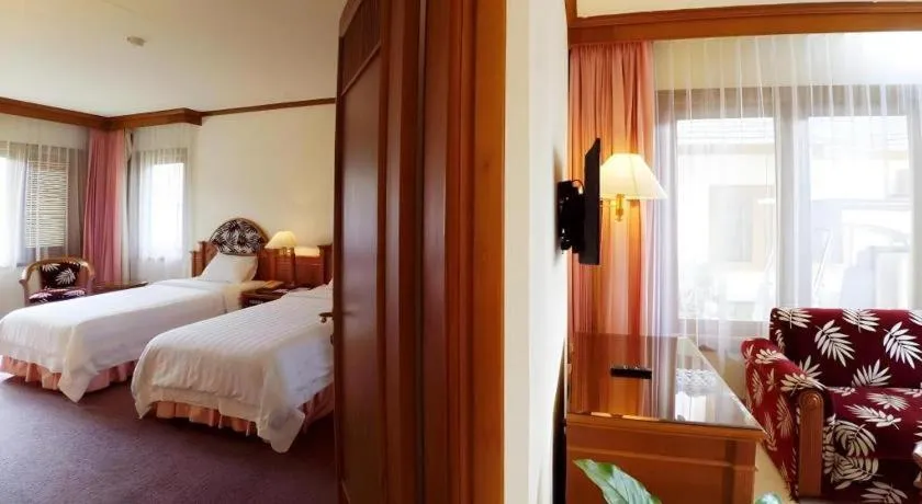 Bed in Purnama Hotel