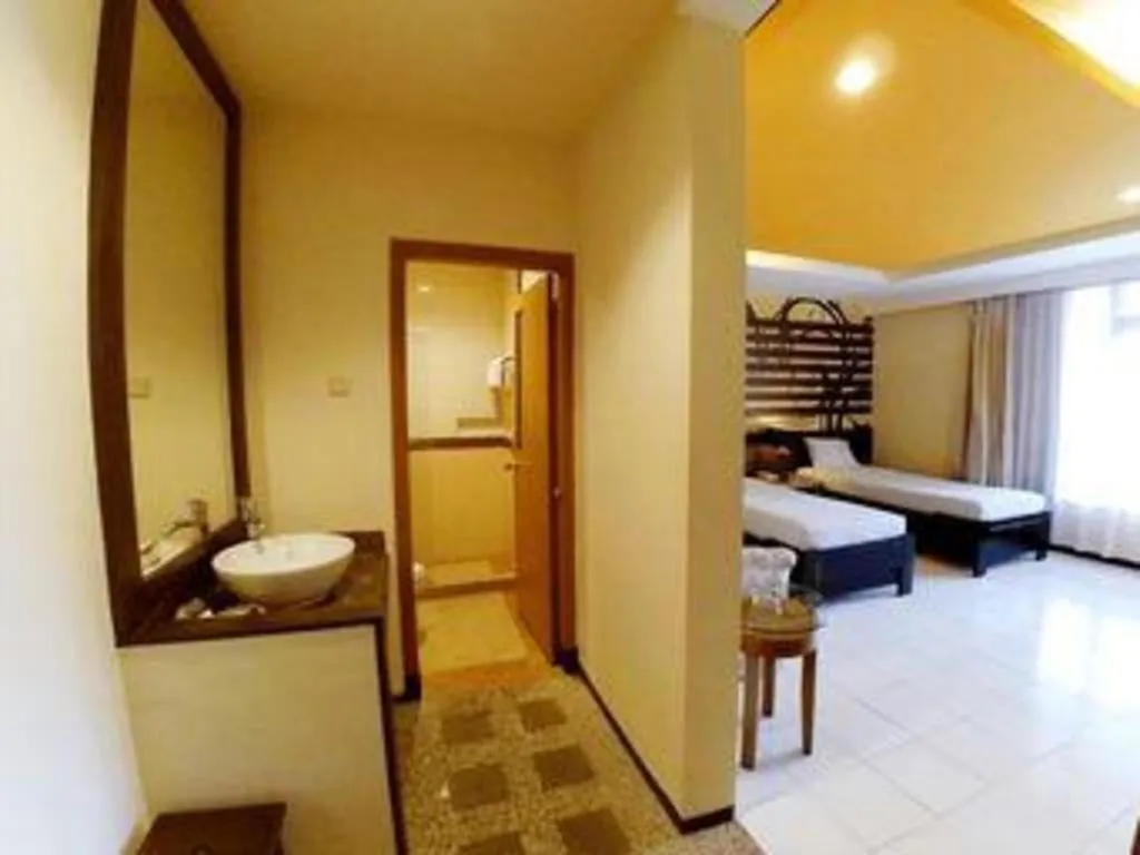 Bed in Purnama Hotel