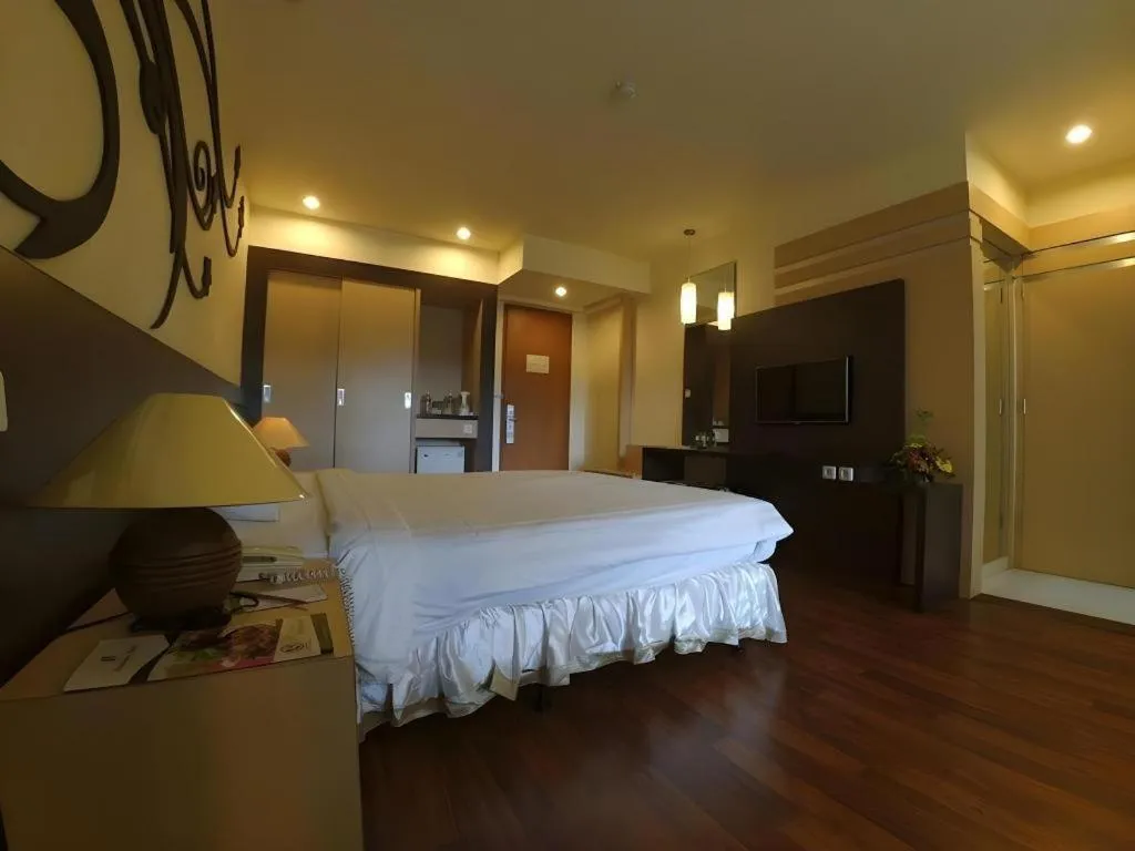 Bed in Purnama Hotel