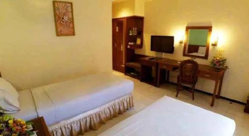 Bed in Purnama Hotel