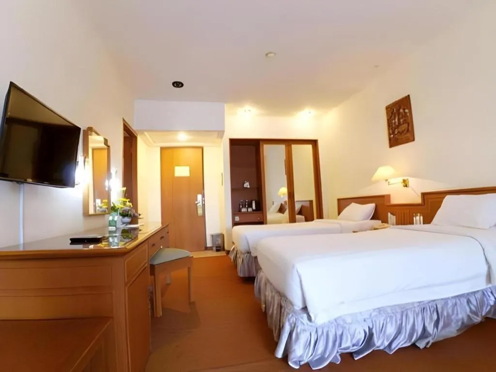 Bed in Purnama Hotel