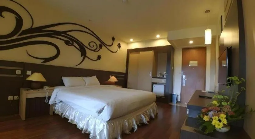 Bed in Purnama Hotel
