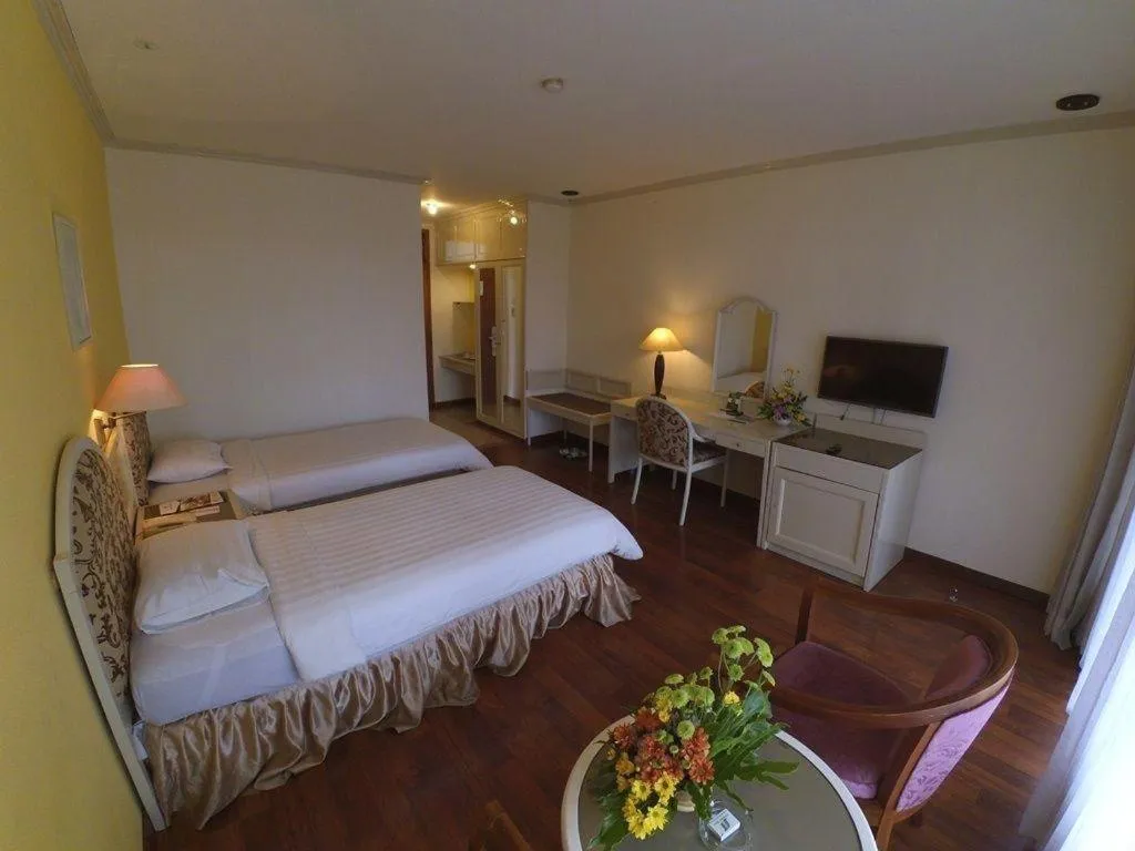 Bed in Purnama Hotel