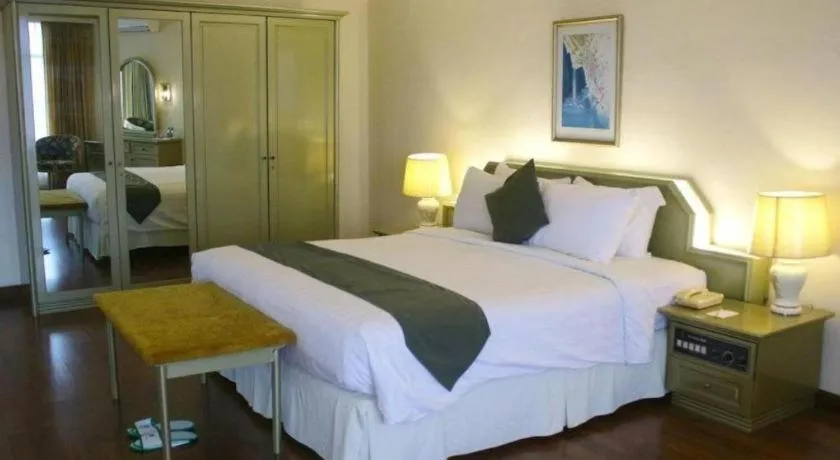 Bed in Purnama Hotel