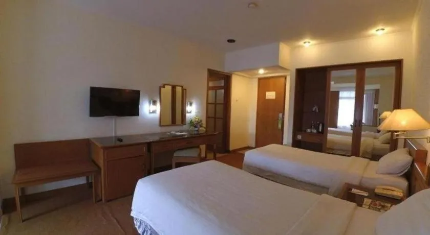 Bed in Purnama Hotel