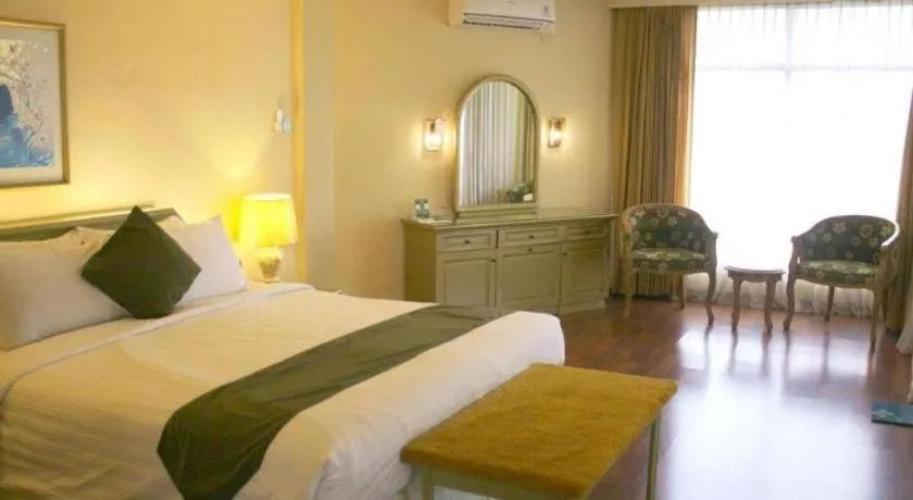 Bed in Purnama Hotel