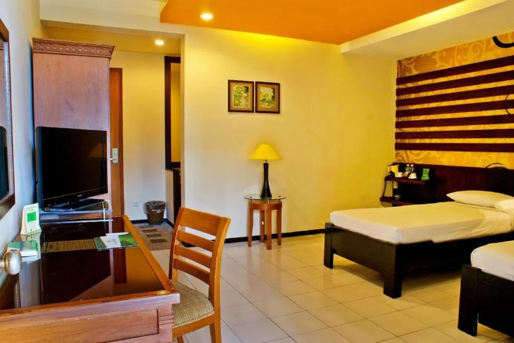 Bed in Purnama Hotel