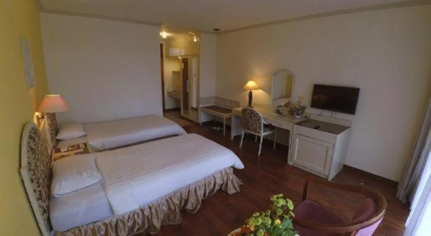 Bed in Purnama Hotel