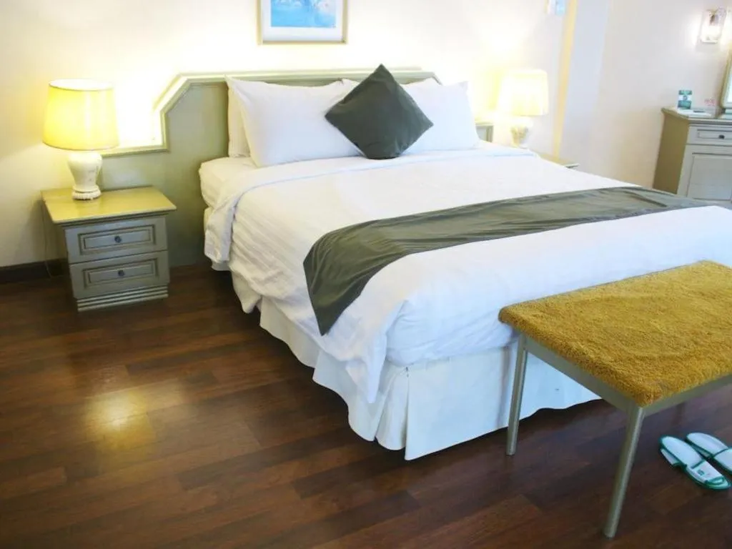 Bed in Purnama Hotel