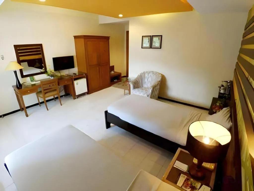 Bed in Purnama Hotel