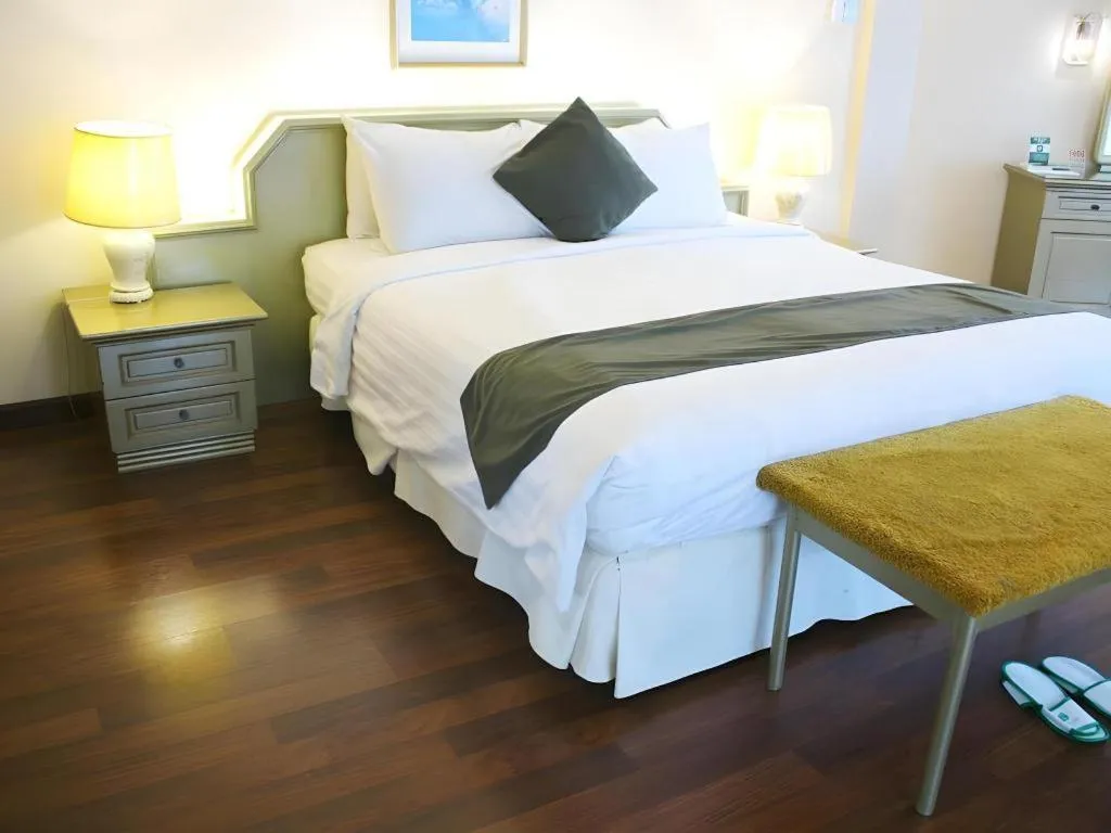 Bed in Purnama Hotel