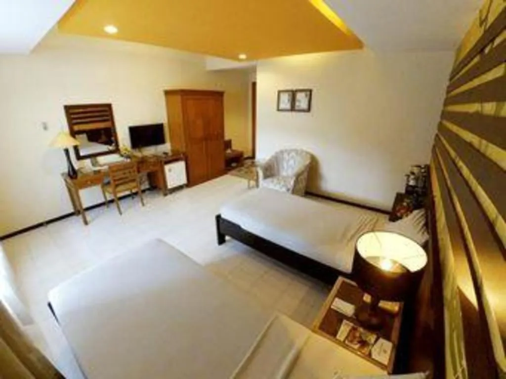 Bed in Purnama Hotel