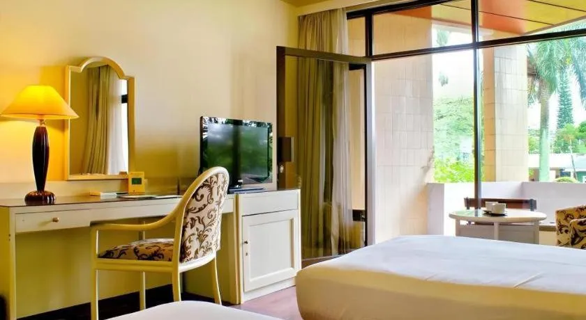 Bed in Purnama Hotel