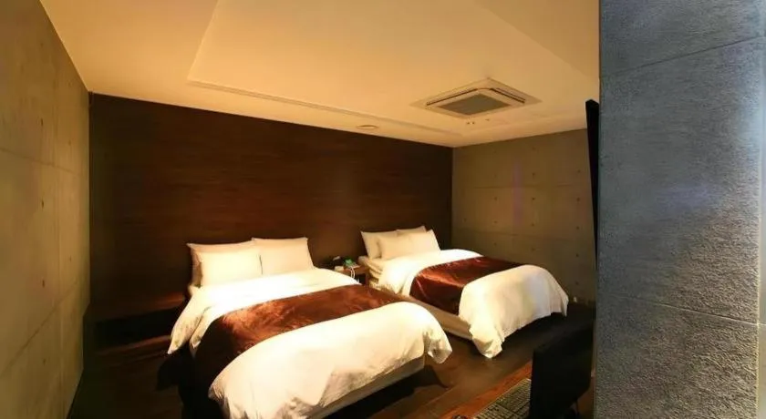 Bed in Nox Boutique Hotel