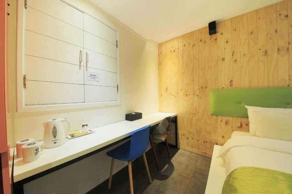 Bed in Nox Boutique Hotel