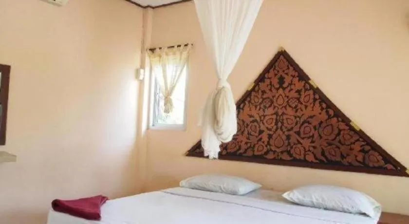 Bed in Jinta Beach Bungalow