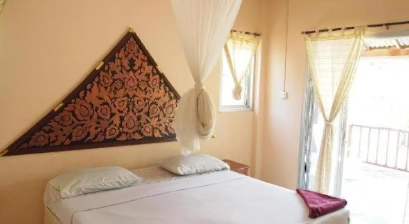 Bed in Jinta Beach Bungalow