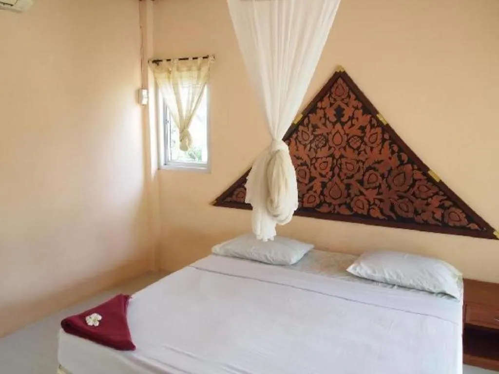 Bed in Jinta Beach Bungalow