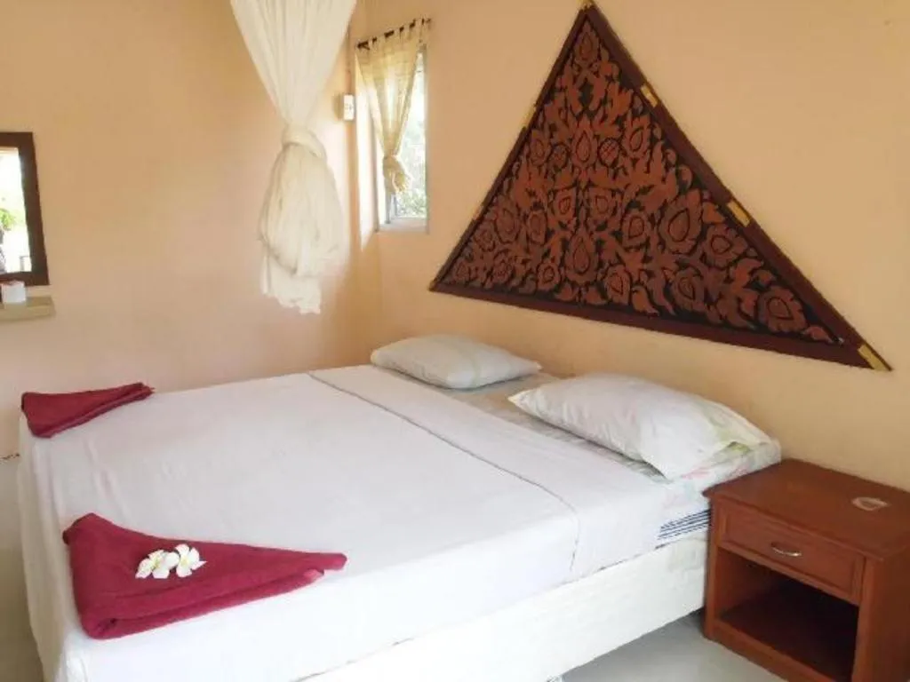 Bed in Jinta Beach Bungalow