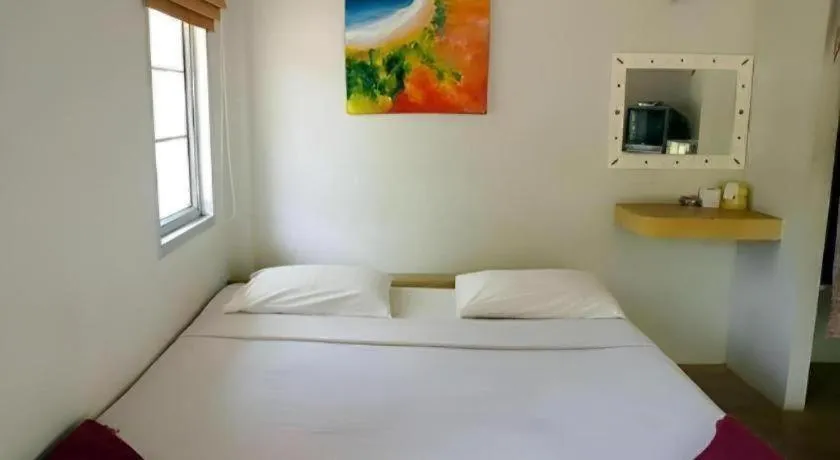 Bed in Jinta Beach Bungalow