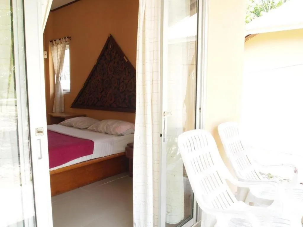 Bed in Jinta Beach Bungalow