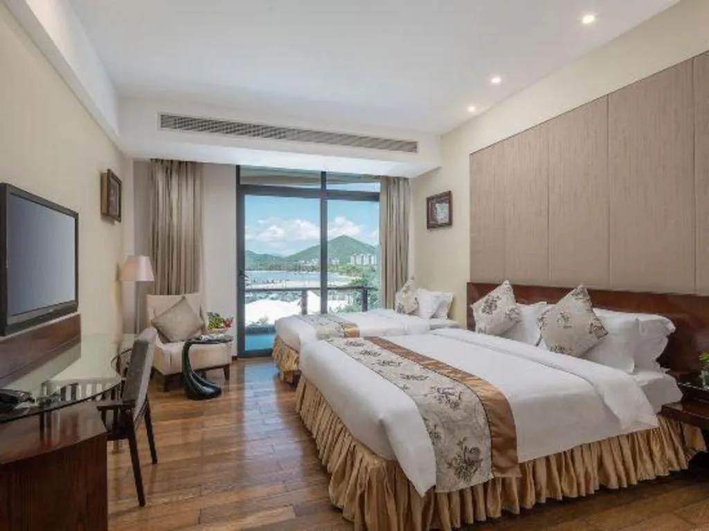 Bed in Serenity Marina Hotel