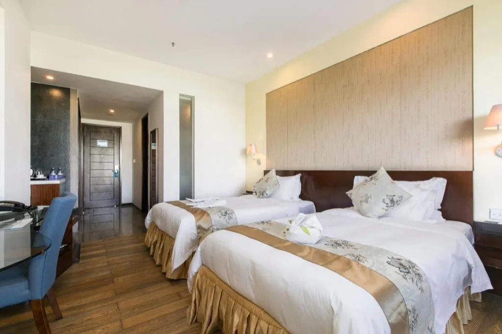 Bed in Serenity Marina Hotel