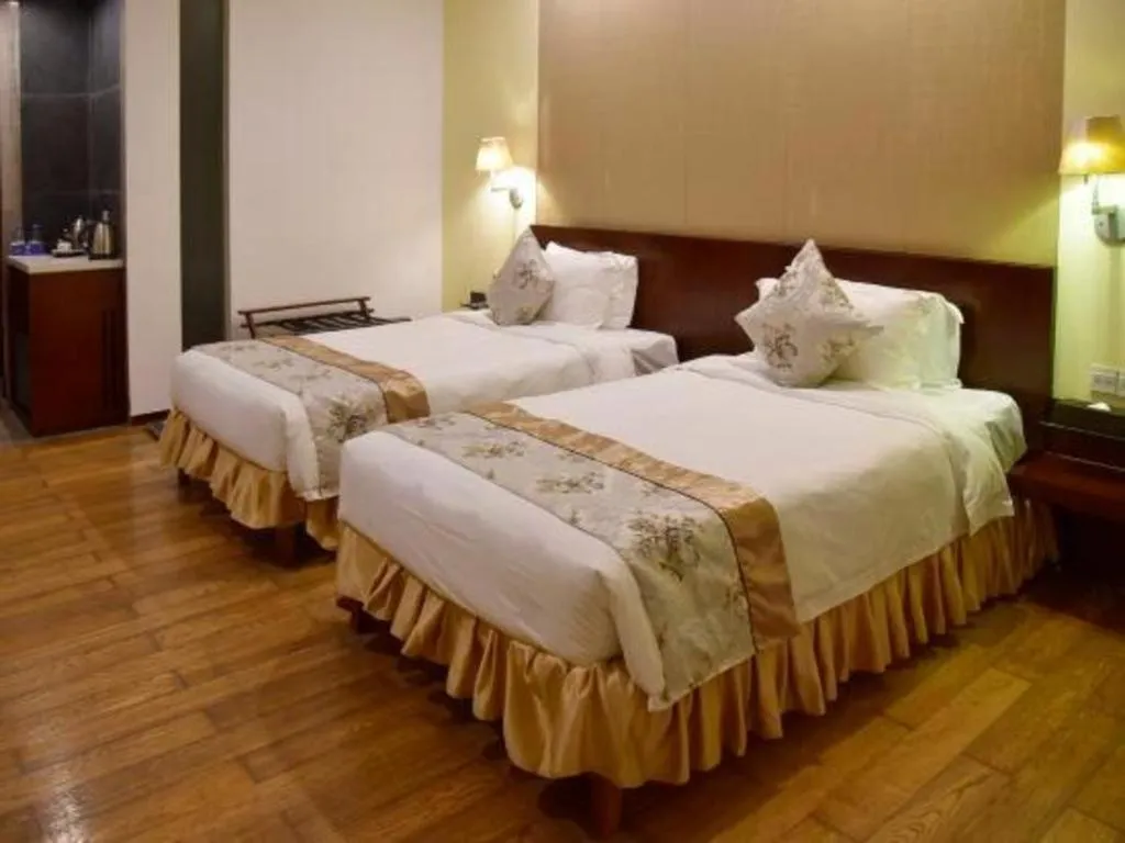 Bed in Serenity Marina Hotel