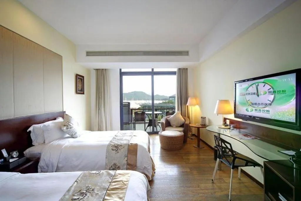 Bed in Serenity Marina Hotel