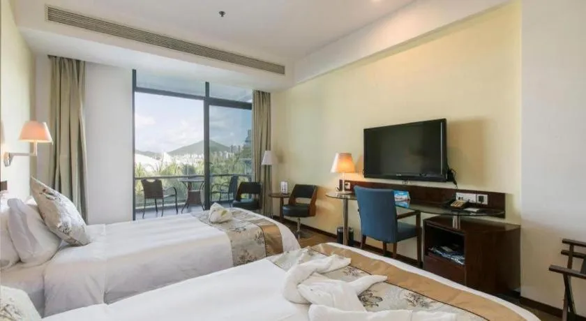 Bed in Serenity Marina Hotel