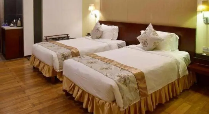 Bed in Serenity Marina Hotel