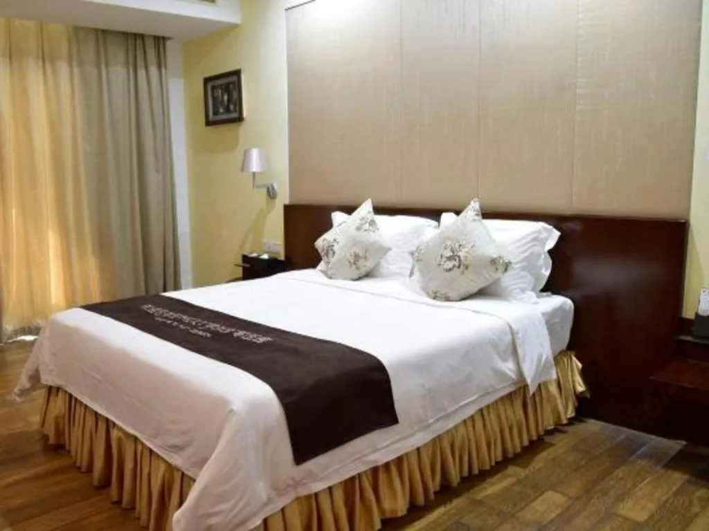 Bed in Serenity Marina Hotel