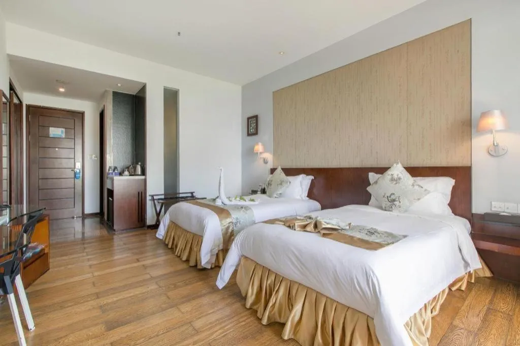 Bed in Serenity Marina Hotel