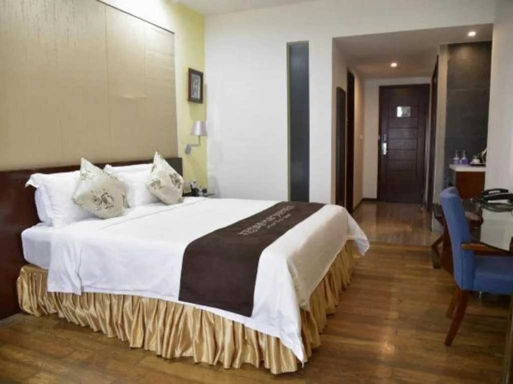 Bed in Serenity Marina Hotel