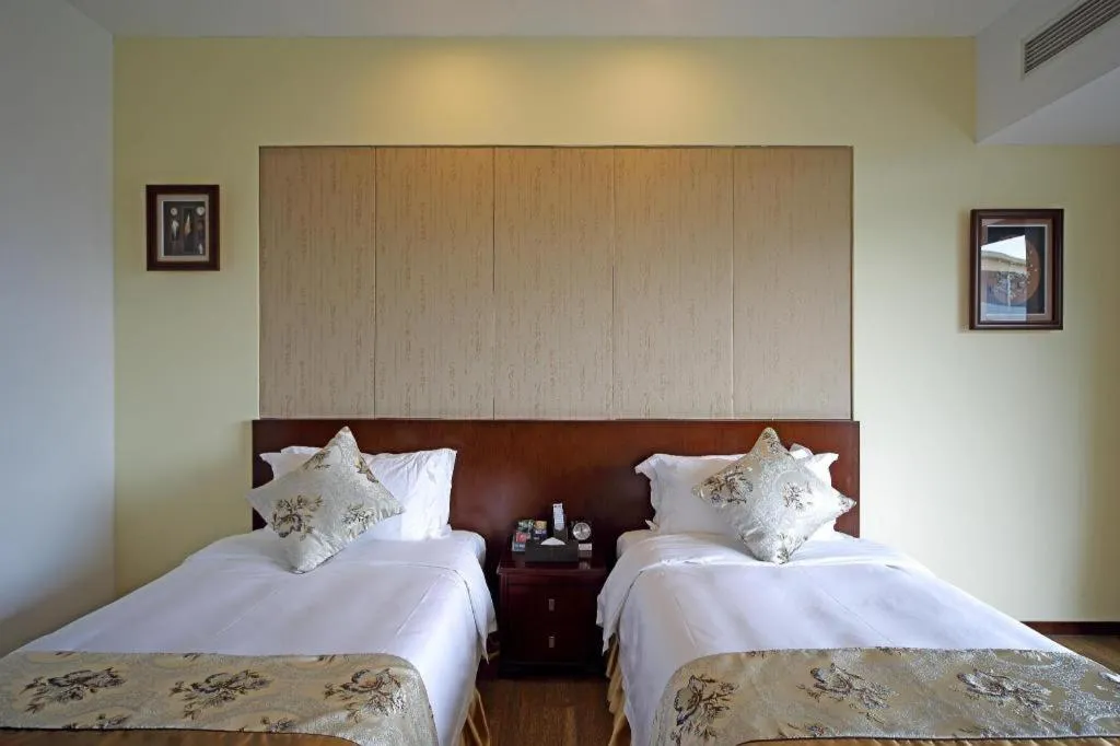 Bed in Serenity Marina Hotel